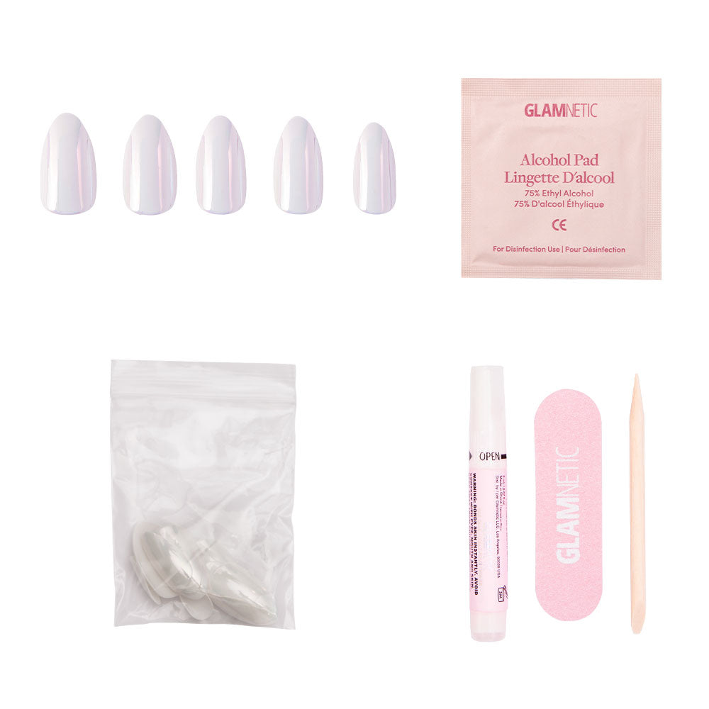 The Moonlight nail kit by glamnetic includes five almond-shaped, pearlescent white nails, an alcohol pad, sealed adhesive tabs, nail glue, a pink nail file, and a wooden cuticle stick—packaged for secure protection. - Product image