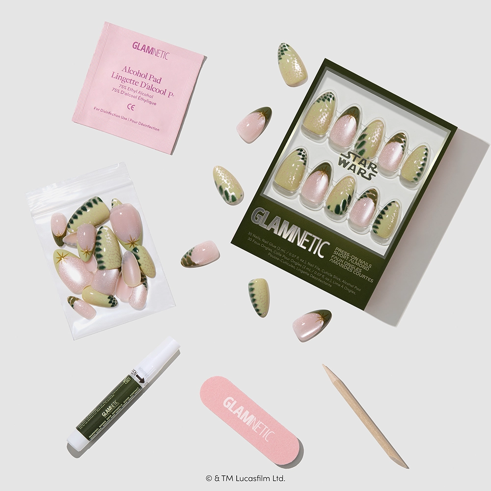 Much To Learn, You Still Have - The glamnetic “Much To Learn, You Still Have” set—including short almond Star Wars press-on nails, nail glue, a pink nail file, a wooden cuticle stick, an alcohol pad, and extra nails—is arranged neatly on a white background.