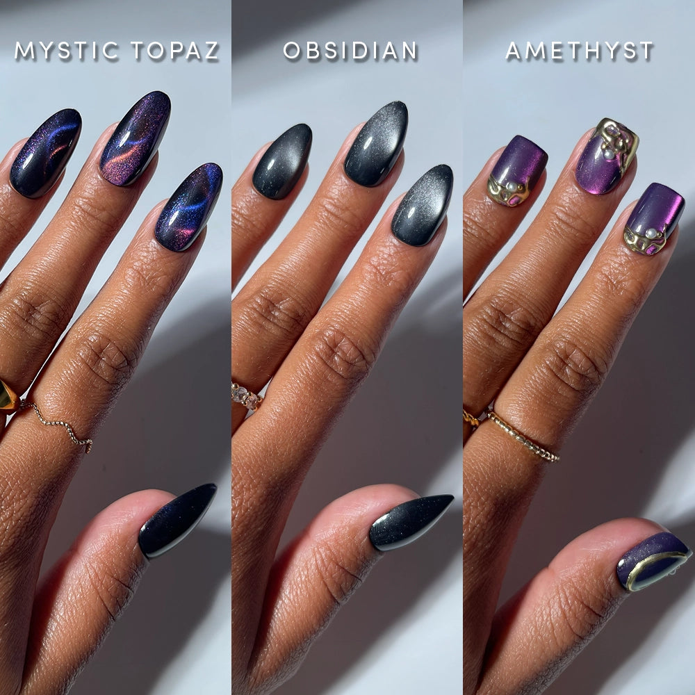 Three manicured hands side by side showcase distinct nail art styles from glamnetic: Mystic Energy (swirled dark shimmer), Obsidian (matte black velvet finish nails), and Amethyst (shiny purple jewel tone nails with gold embellishments). Text labels identify each style above the hands.