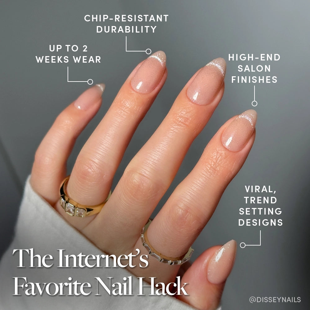 Hand wearing Glamnetic “Not Your Cinder-Ella” nails highlighted by text overlays emphasizing features like chip-resistance, viral design, and salon finish. - Product image