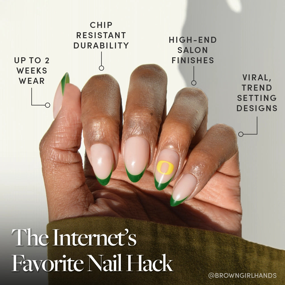 A hand with Oregon Ducks Press-On Nails by glamnetic is shown, highlighting up to 2 weeks wear, chip-resistant durability, salon-quality finish, and trendy designs. Below is the text: The Internet’s Favorite Nail Hack. - Product image