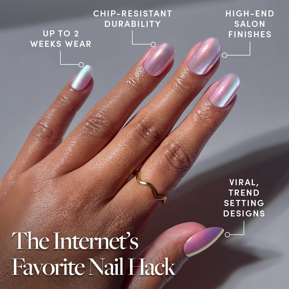 A hand with iridescent, pearl-pink nails flaunts glamnetic's Oyster Glow—chip-resistant press-ons with up to 2 weeks of wear and salon-quality shine. Text: The Internet’s Favorite Nail Hack. - Product image