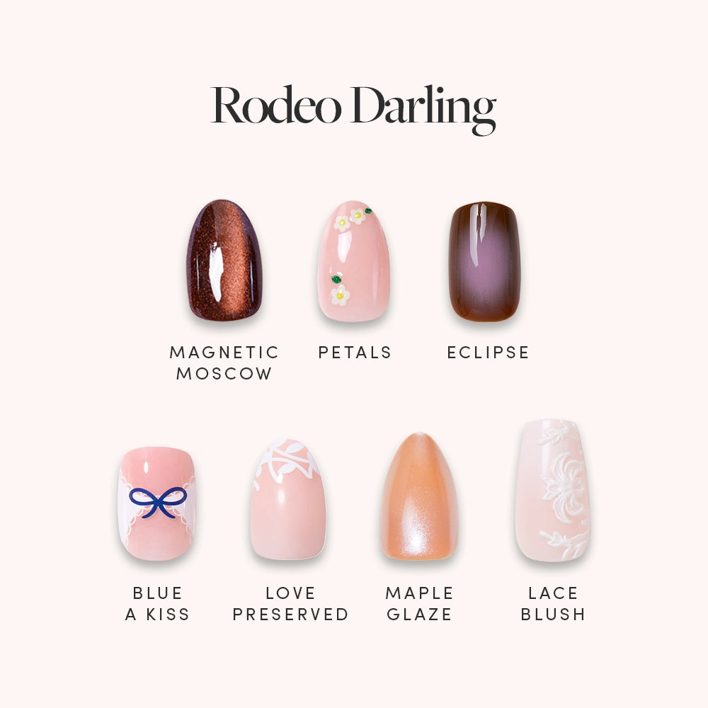 Six glamnetic Rodeo Darling artificial nail sets displayed vertically with designs: metallic brown, floral pink, ombré, white with blue bow, striped pink, shimmering peach. Get salon-quality festival nails. Brand name above the set.