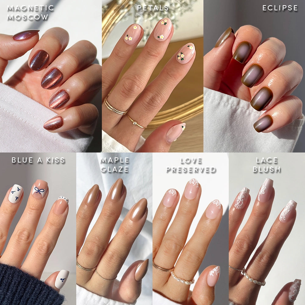 Eight hands flaunt trendy Rodeo Darling nails by glamnetic, featuring metallics, florals, brown ombré, blue accents, glossy brown, hearts, pink with white tips, and lace—perfect inspiration for festival-ready or stylish nail sets.