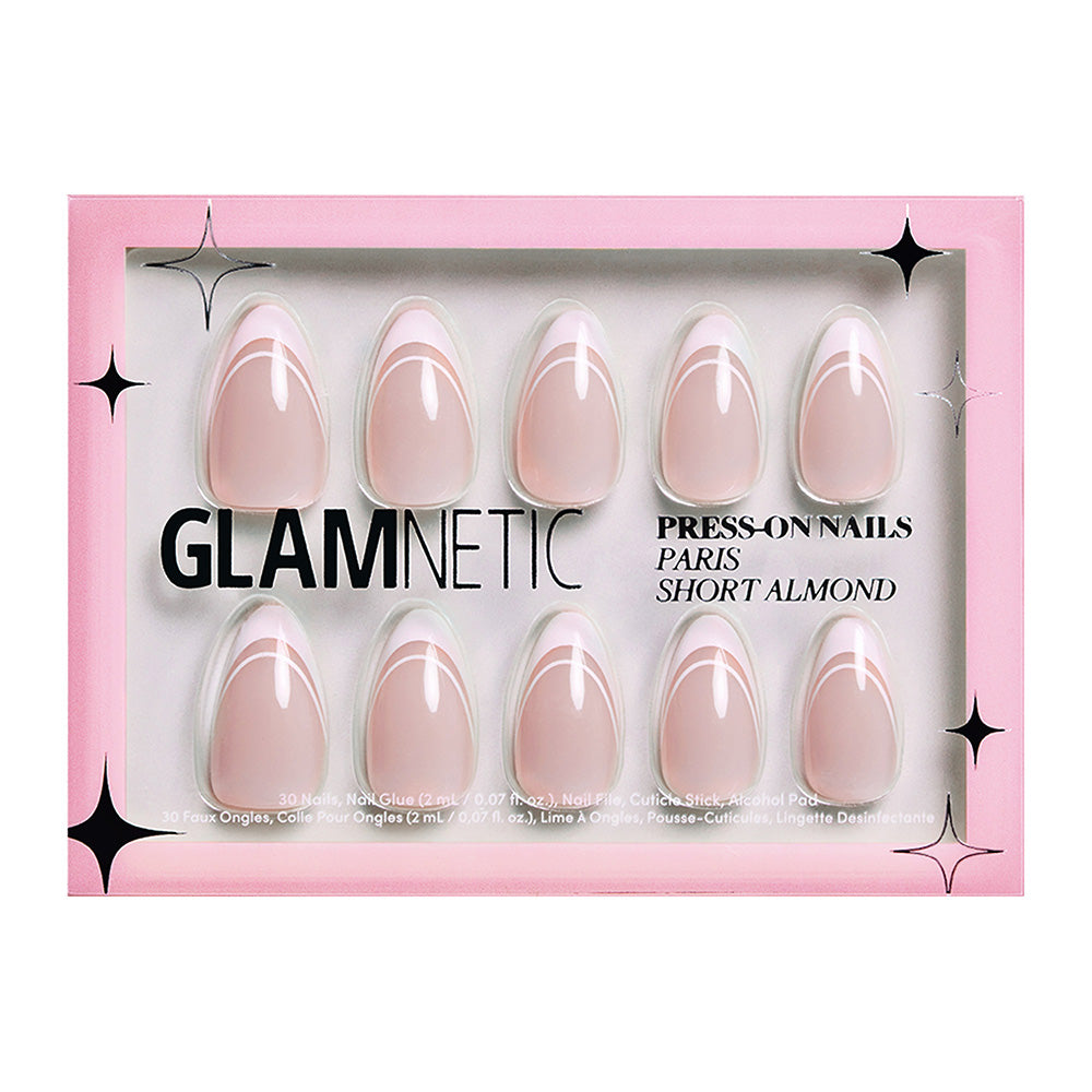 A pink glamnetic Paris Press-On Nail Set showcases ten glossy nude short almond nails in two rows, with black star accents on the packaging for a touch of French elegance. - Product image