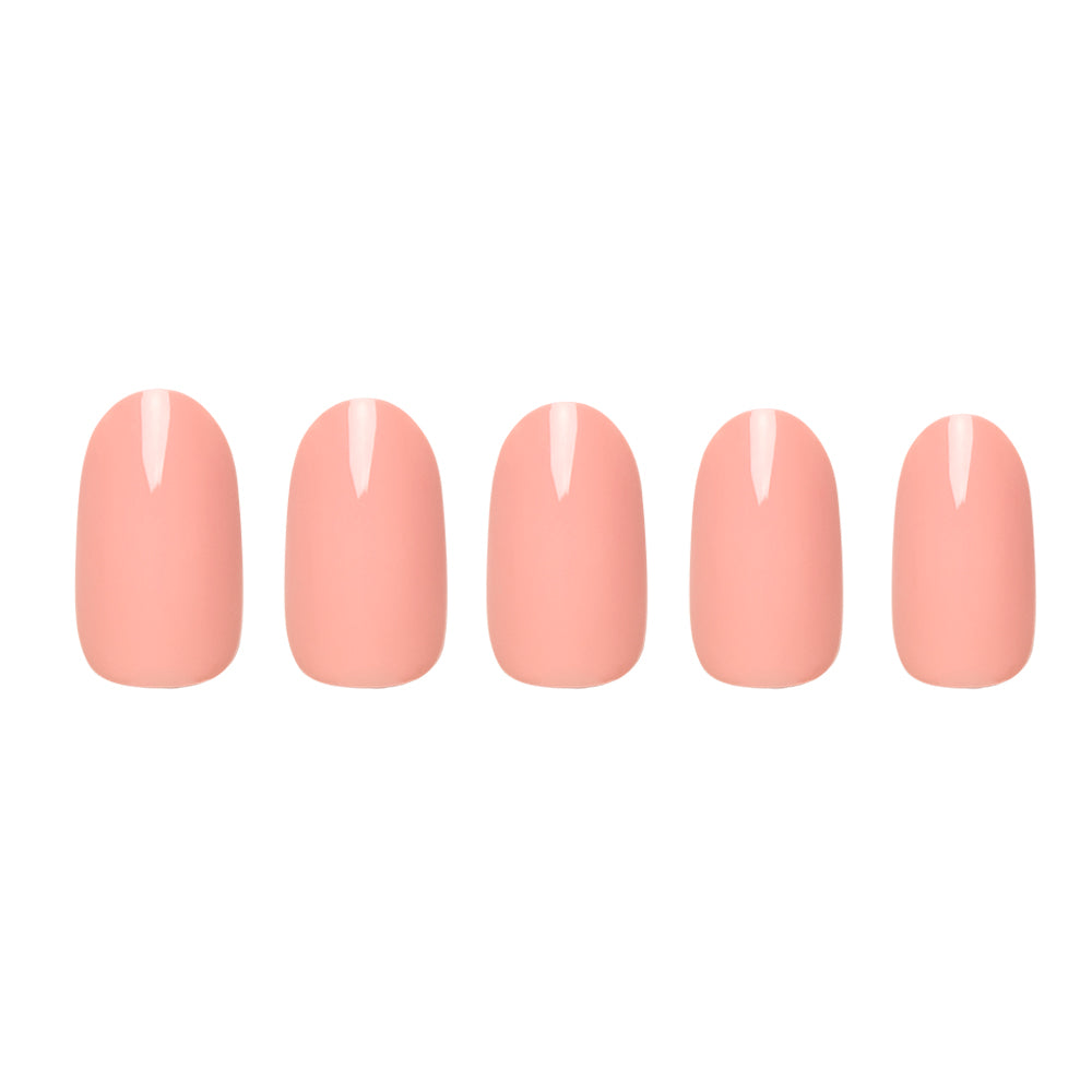 Five glossy, pastel peach artificial nails from glamnetics Peach Coral set are arranged in a row on a white background, highlighting their elegant design. - Product image