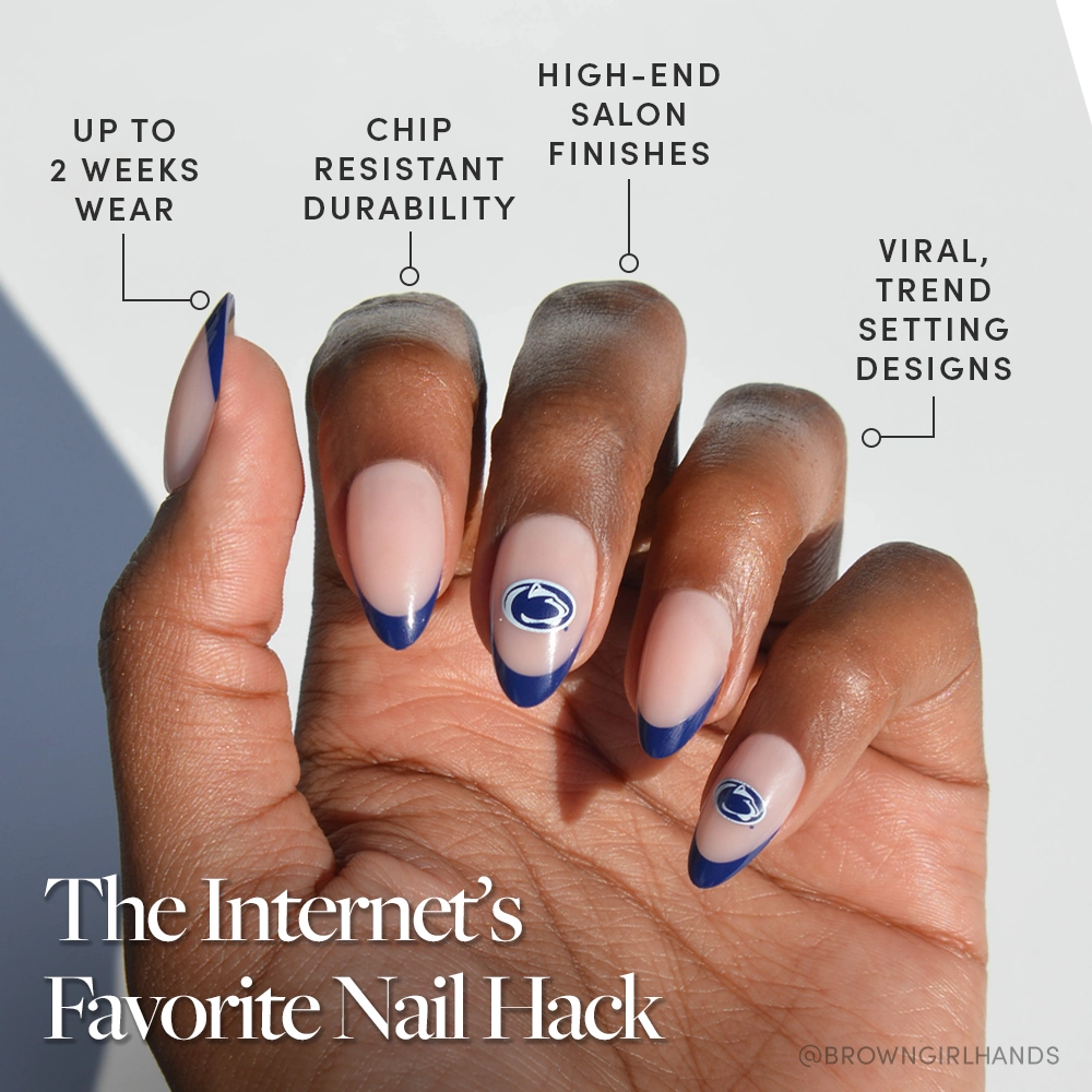 Show your Penn State pride with glamnetics Penn State Nittany Lions Press-On Nail Set. Features almond-shaped nails with a nude base, navy blue French tips, an accent logo nail, and a salon-quality finish that’s durable and stylish. - Product image