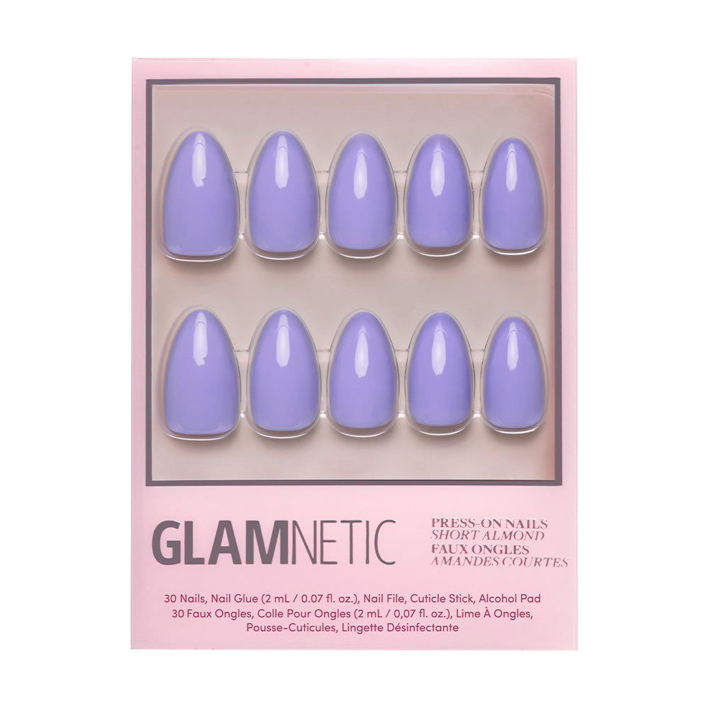 A box of glamnetic Periwinkle press-on nails in short almond shape, featuring 10 glossy periwinkle nails in two rows on a light pink background. Pack includes nail glue and application tools. - Product image