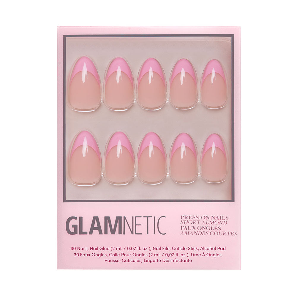 A glamnetic Pink Macaron press-on nail set in short almond shape with French tips. Includes 30 nails, nail glue, nail file, cuticle stick, and alcohol pad. - Product image