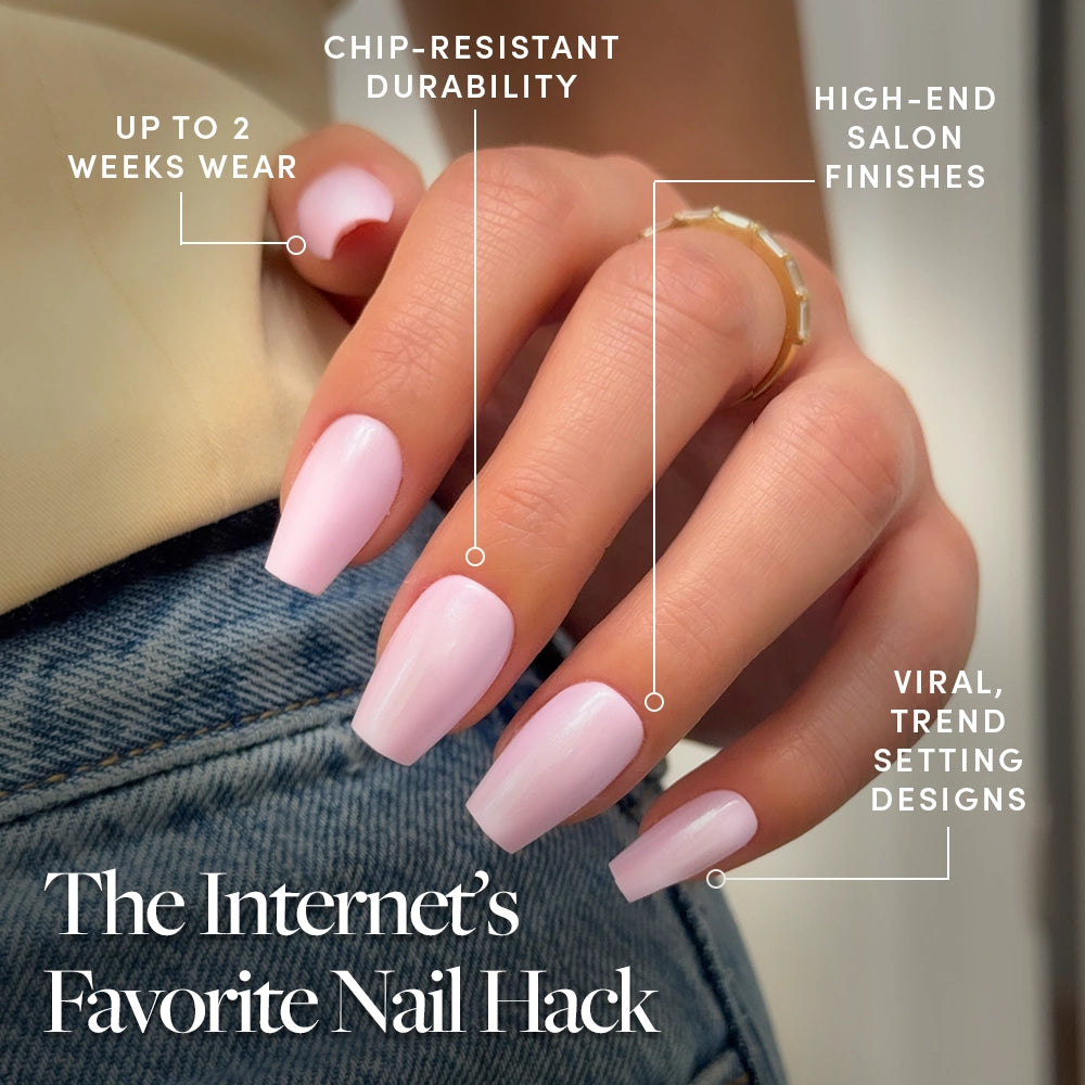 A close-up shows a hand with long, pale pink coffin nails—glamnetic Pink Statement press-ons—featuring up to 2 weeks wear, chip-resistant durability, high-end salon finish, and viral trend-setting glossy design. - Product image