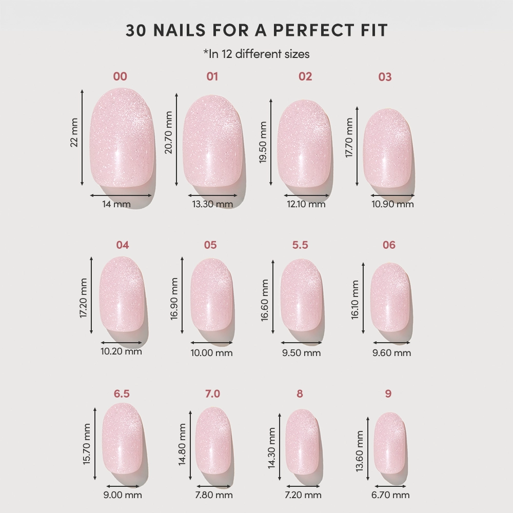 A chart titled "30 Nails for a Perfect Fit" displays 12 sizes of glamnetic's Pink Whisper salon-quality press-ons, each size labeled with width and length in millimeters and arranged neatly in rows. - Product image