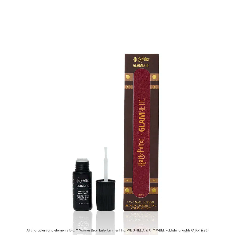 The glamnetic Polish & Prep is a Harry Potter-themed nail product in a rectangular box with gold and burgundy designs. Inside, there’s a white brush applicator and a small black bottle of long-lasting mani nail glue.