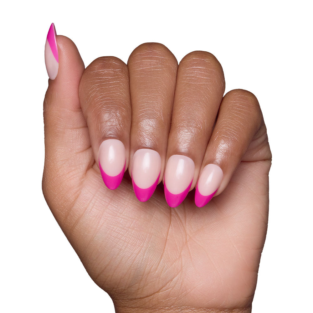 A hand with medium brown skin displays neatly manicured almond nails, each with a nude base and magenta-pink French tip, highlighting the vibrant style of glamnetics Raspberry Sorbet nail set. - Product image