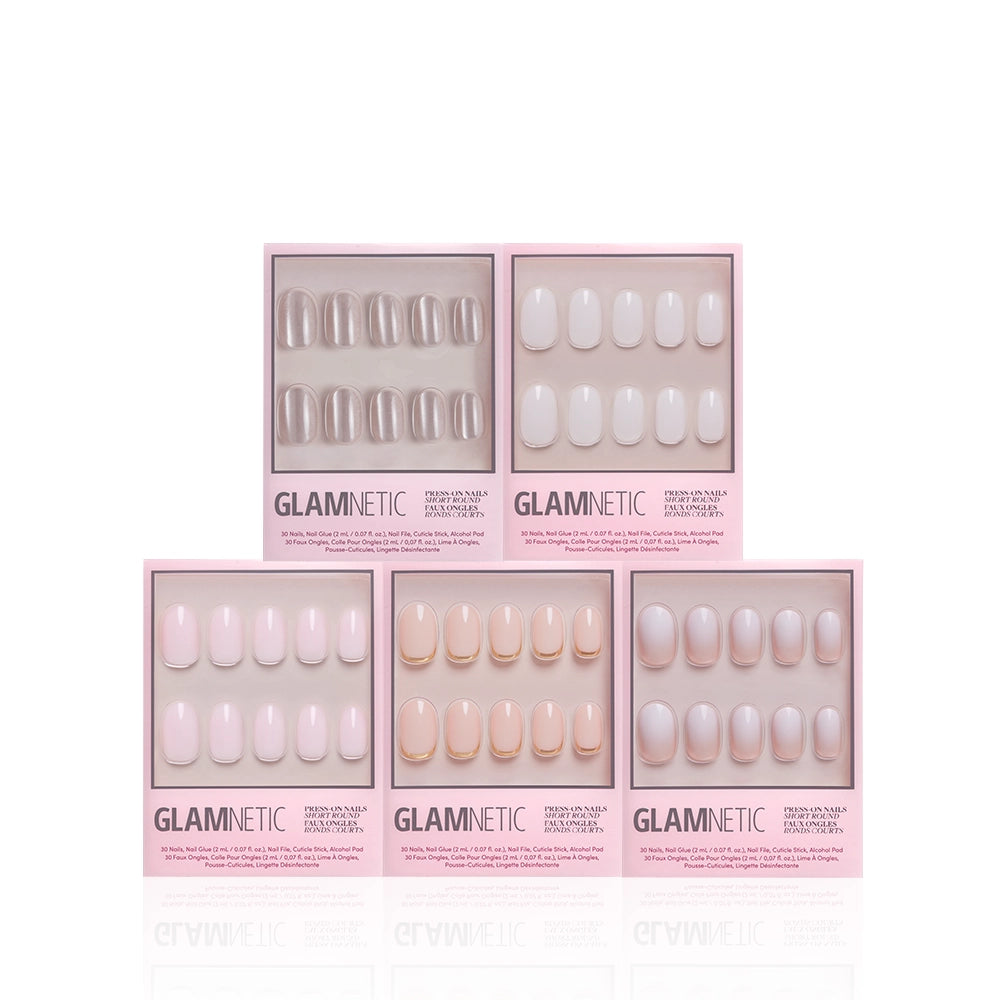 Five boxes of glamnetic’s Clean Girl Round Up press-on nails, arranged in two rows on a white background. Each box showcases salon-quality nails in a variety of soft pink and nude pastel shades. - Product image