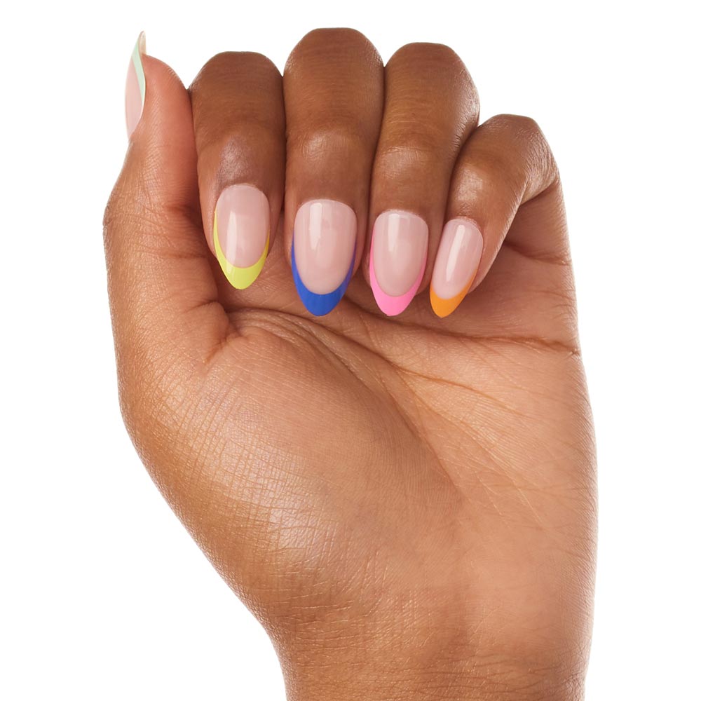 A hand with medium brown skin shows off almond-shaped nails featuring glamnetics Sprinkles: a natural base with pastel green, yellow, blue, pink, and orange French tips—all against a white background. - Product image