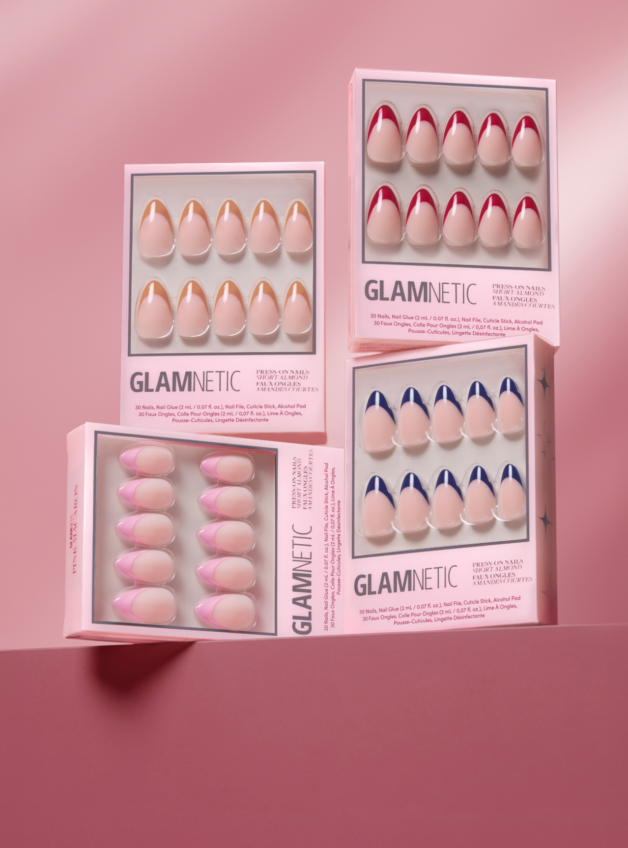 Glamnetic nail product packaging on a pink background