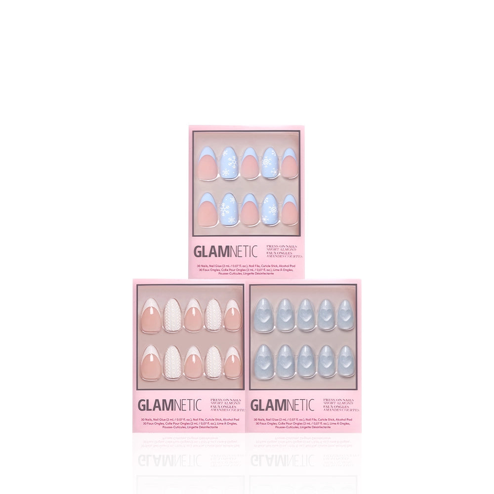 Three boxes of glamnetic press-on nails in the "Snow Play" design are stacked together with pink borders, elegantly displayed on a white background. - Product image