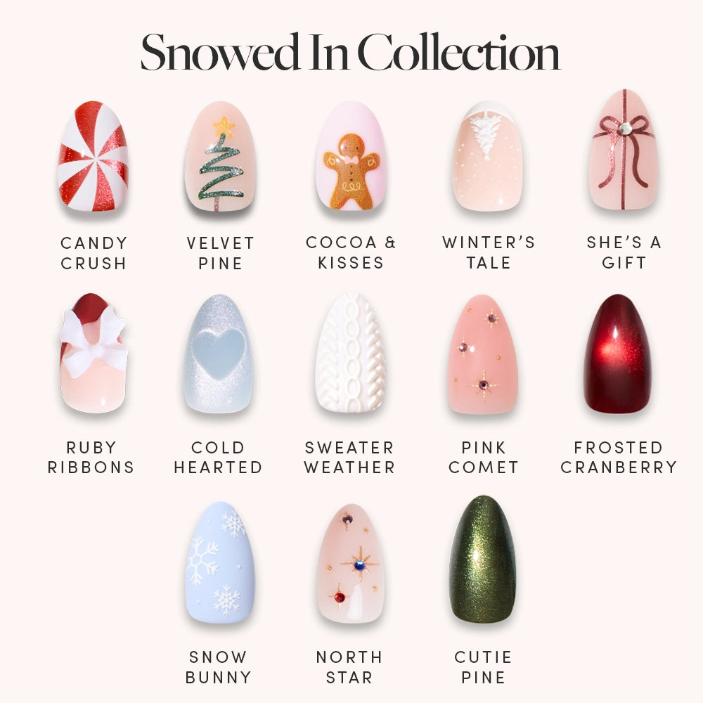 The glamnetic Snowed In Collection features 15 almond press-on nails with festive holiday designs, each named after winter themes like Candy Crush, Velvet Pine, and Snow Bunny, arranged in three rows on a light background.