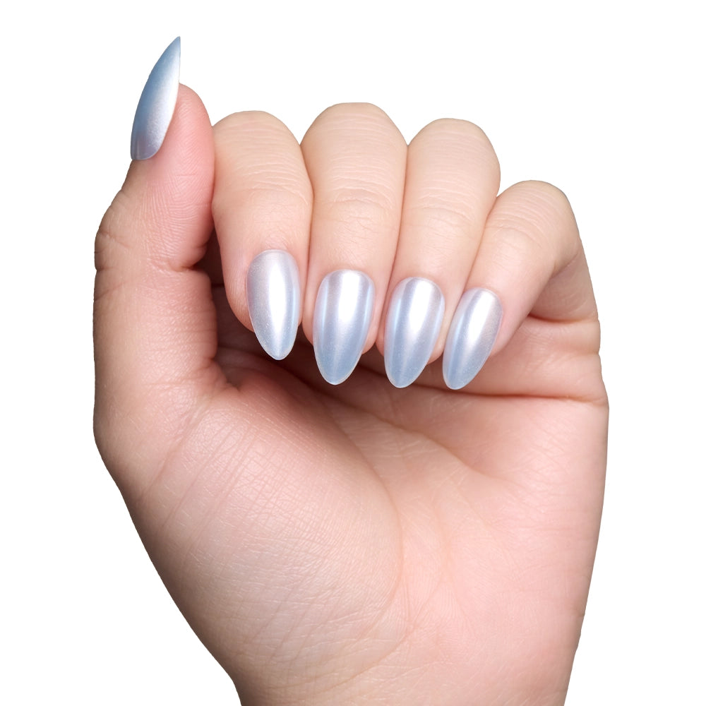 A hand with short almond nails, painted in glamnetics Something Blue shade, is shown against a white background for a salon-quality look. - Product image