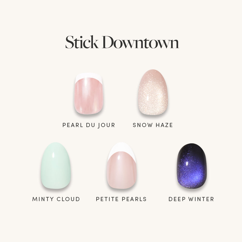 Discover five elegant nail designs perfect for any occasion with the glamnetic Stick Downtown Quick Press Manis nail bundle: Pearl Du Jour (pink with white tip), Snow Haze (shimmery nude), Minty Cloud (light mint green), Petite Pearls (sheer pink with white half-moon), and Deep Winter (shimmery dark blue). Enjoy salon-quality, no-glue nails from glamnetic for a flawless look in minutes. - Product image