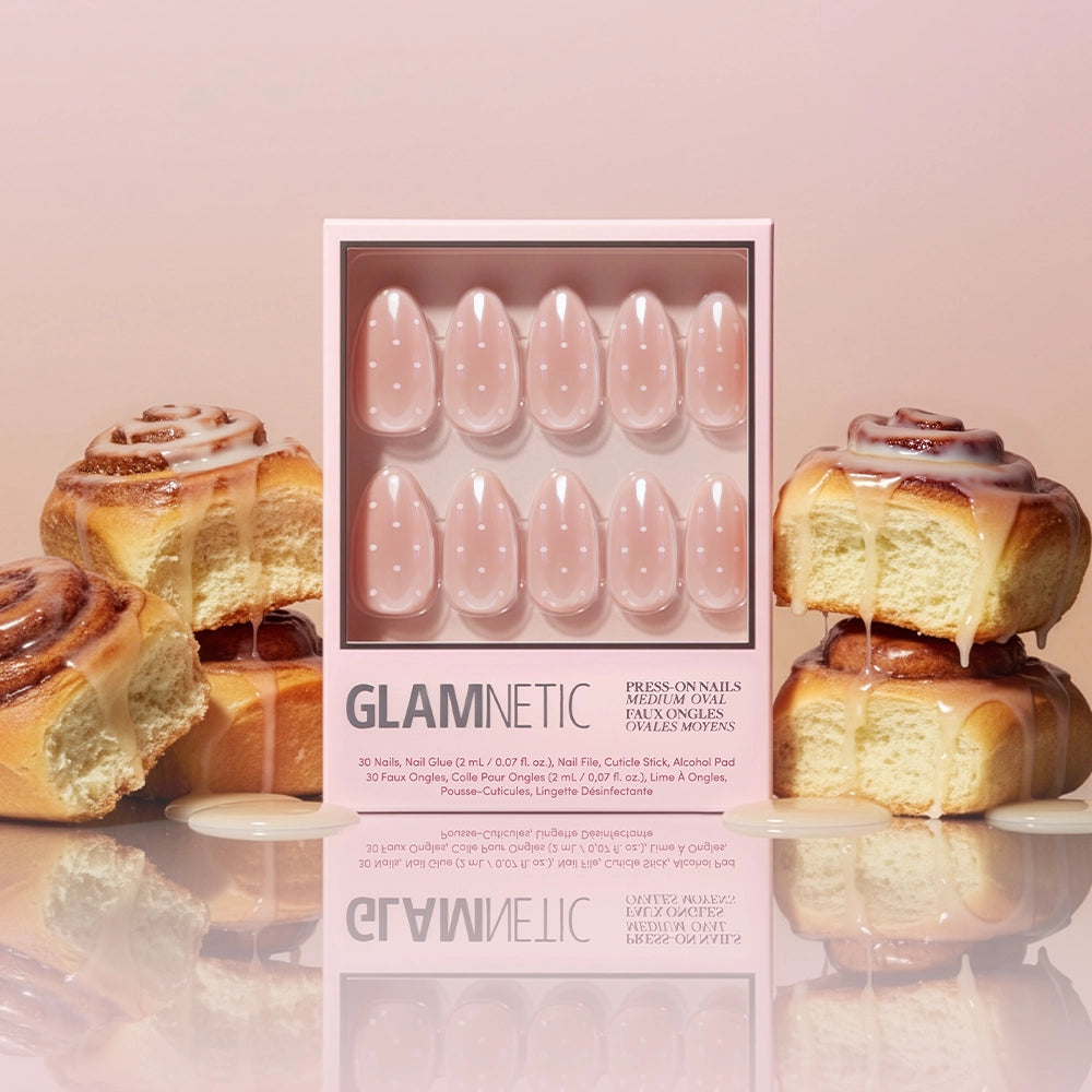 GLAMNEATIC press-on nails packaging with cinnamon rolls on a reflective surface - Product image