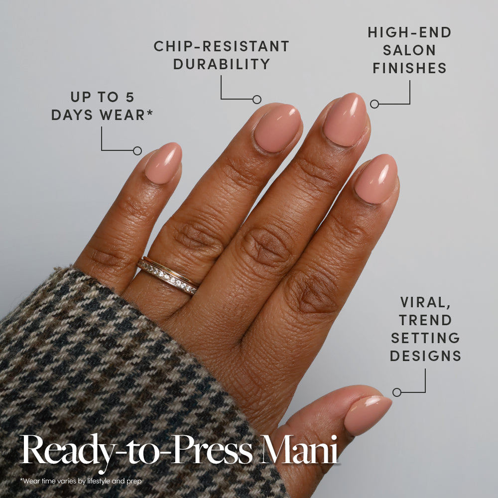 A hand displays glamnetic’s Teddy press-on nails in a nude shade. Features include up to 2 weeks wear, chip-resistant durability, salon-quality finish, and trendy, viral stick-on designs. - Product image