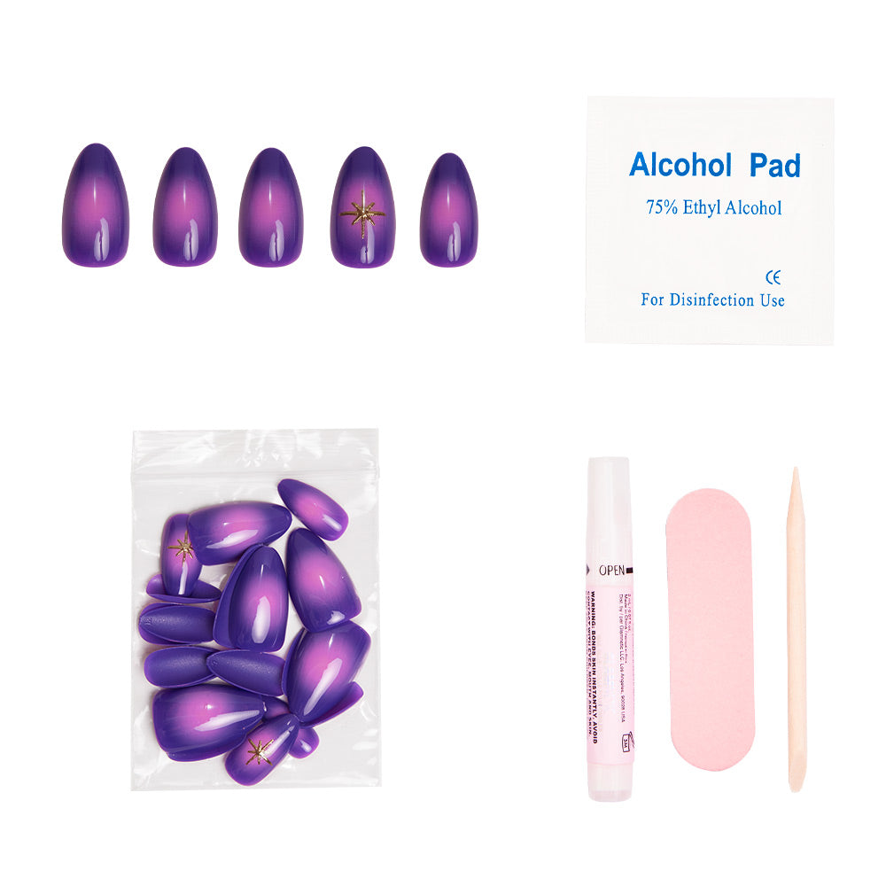 The glamnetic Tarot set includes short almond press-on nails in mystical purple with star designs, plus an alcohol pad, extra nails, glue tube, pink nail file, and wooden cuticle stick on a white background. - Product image