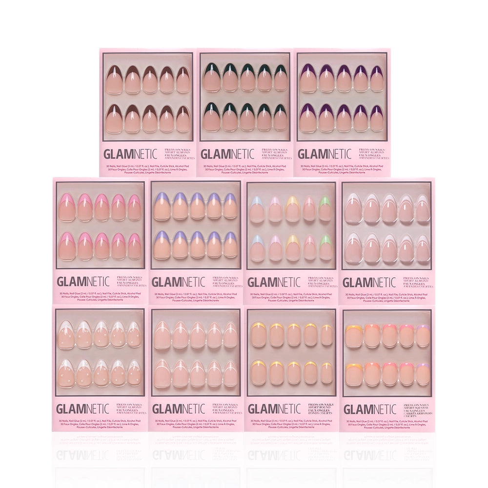 Twelve boxes of glamnetic's The Frenchies press-on nails in assorted nude and pastel French tip styles are arranged in three rows, each box featuring a variety of sizes and designs. - Product image