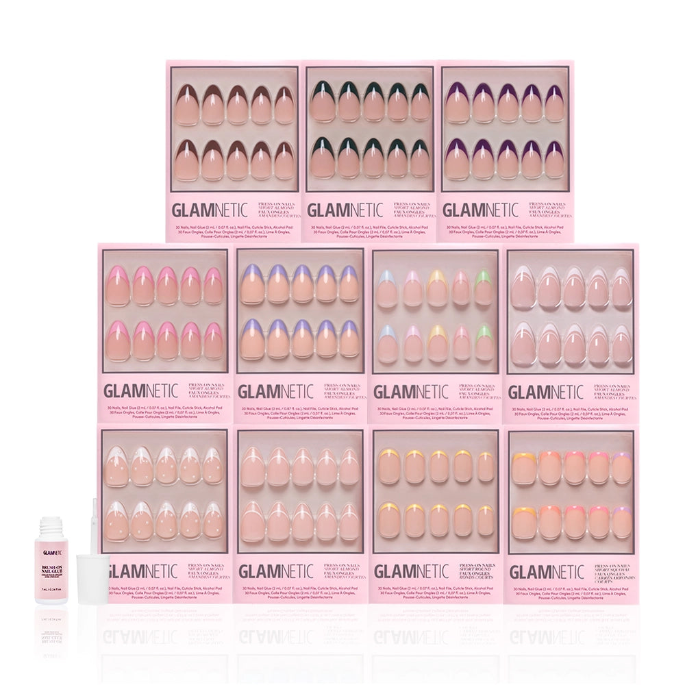 Twelve boxes of glamnetic The Frenchies pastel French tip press-on nails in assorted pink and pastel styles are arranged in three rows, with a small nail glue bottle at the lower left. - Product image