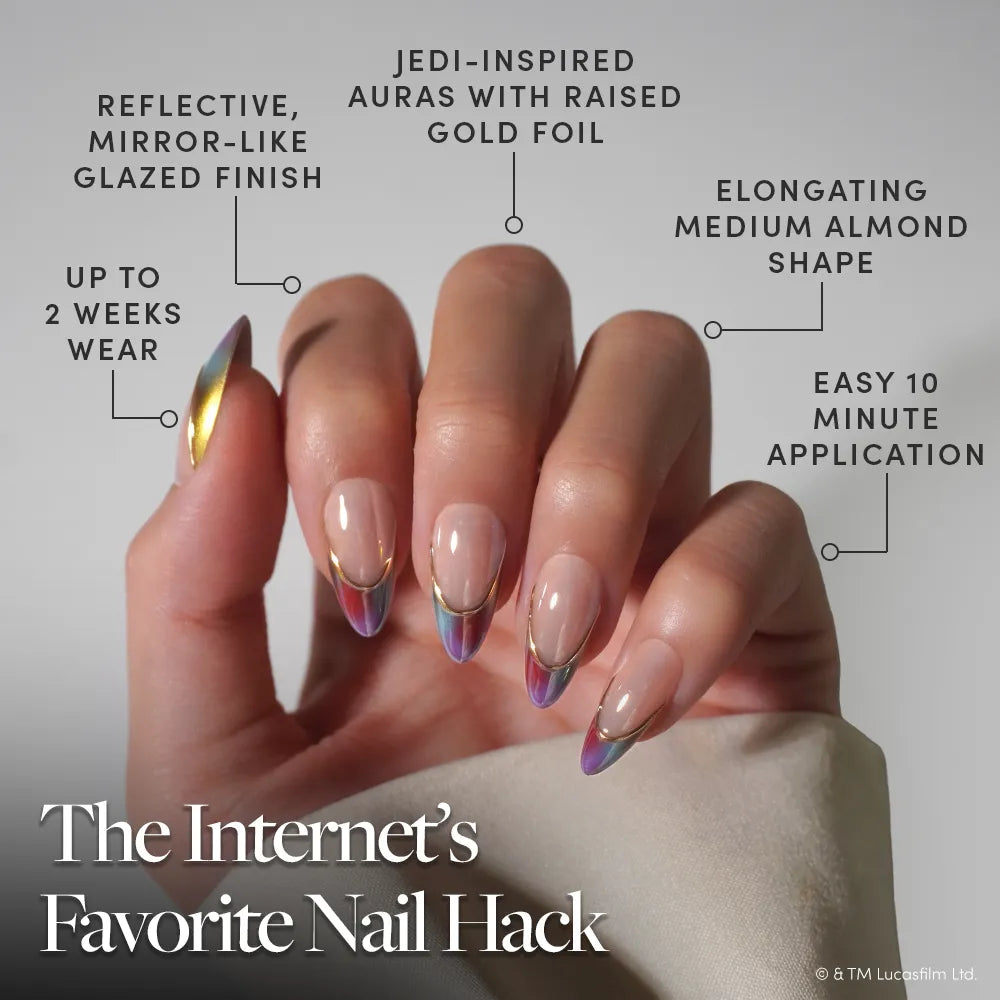 The Jedi Order - A hand displays almond-shaped nails featuring reflective gold foil tips and a radiant, glazed finish. Text highlights include a mirror-like gloss, Jedi-inspired aura, easy 10-minute application, and up to 2 weeks of wear—introducing The Jedi Order press-on nails by glamnetic for STAR WARS fans seeking a cosmic manicure.