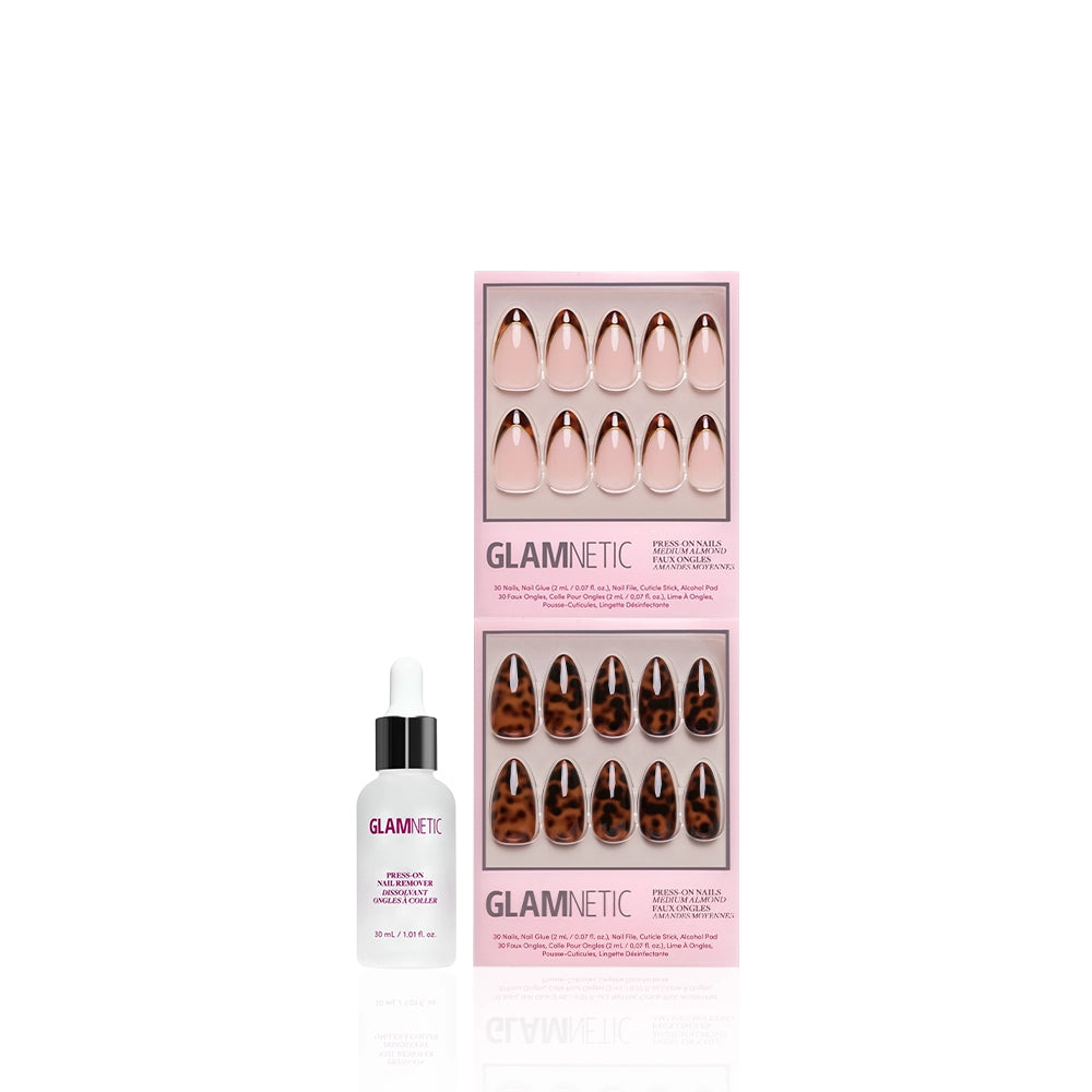 The glamnetic Medium Almond Tortoiseshell Duo features two packs of press-on nails—one nude pink, one tortoiseshell—shown with a bottle of Glamnetic Cuticle Oil, all displayed against a white background. - Product image