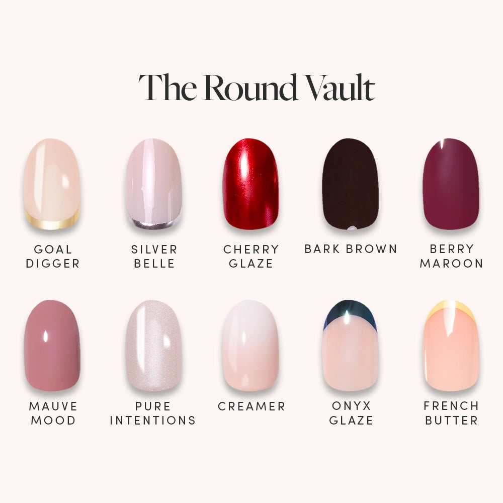The Round Vault by glamnetic features 10 short round nails in shades like Goal Digger, Silver Belle, Cherry Glaze, Bark Brown, Berry Maroon, and more—a limited-edition bundle perfect for colorful nail looks.