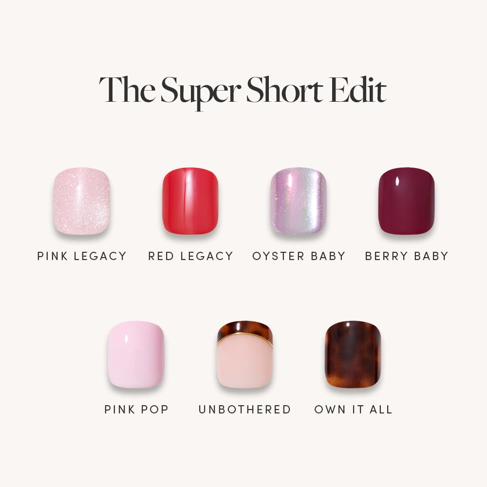 Six glamorous press-on nails from glamnetic’s The Super Short Edit are shown in a grid: Pink Legacy (glitter), Red Legacy, Oyster Baby (iridescent purple), Berry Baby, Pink Pop, Unbothered (nude), and Own It All (tortoiseshell).