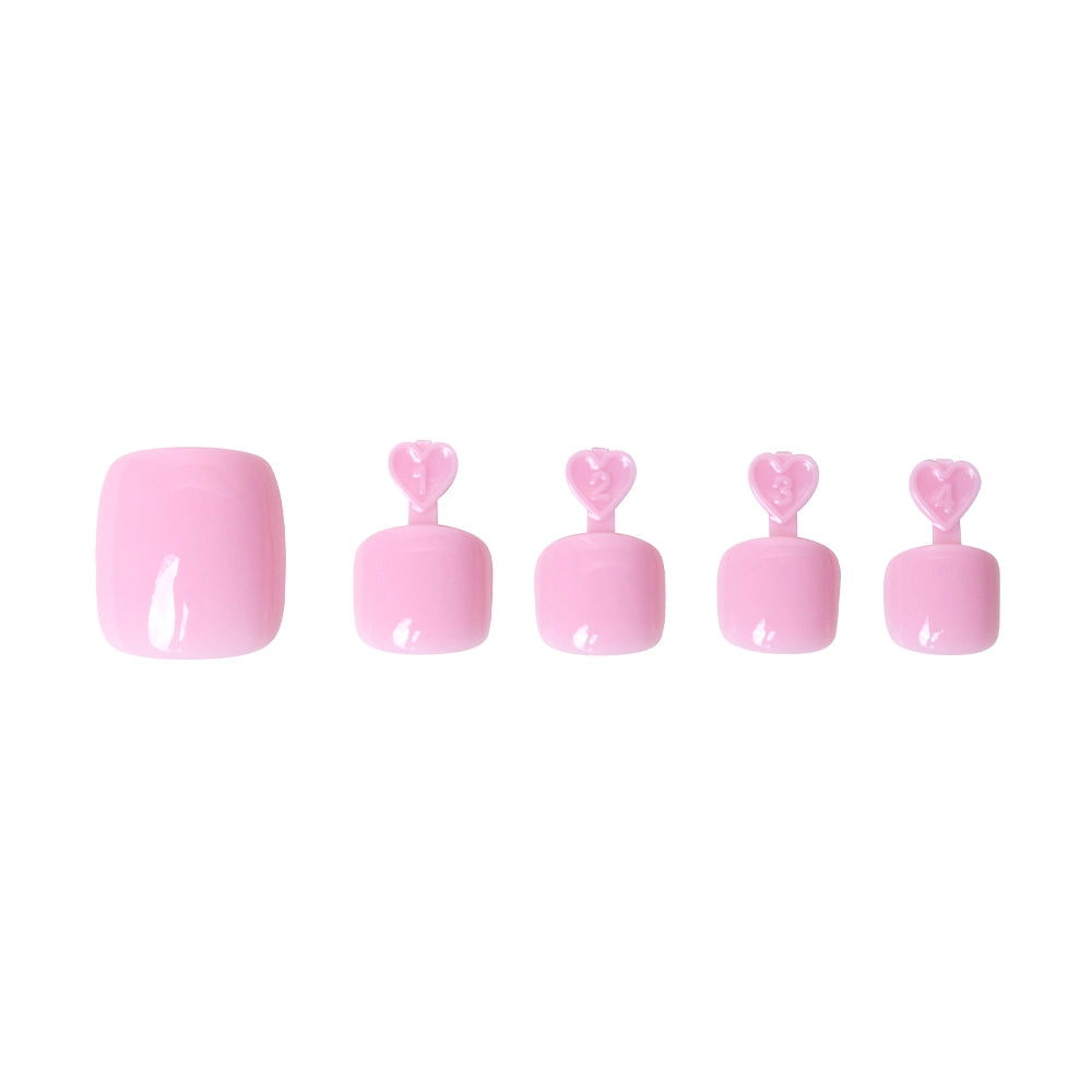 Glossy pastel pink press-on toenails in five sizes, each with heart-shaped tabs for application. - Product image