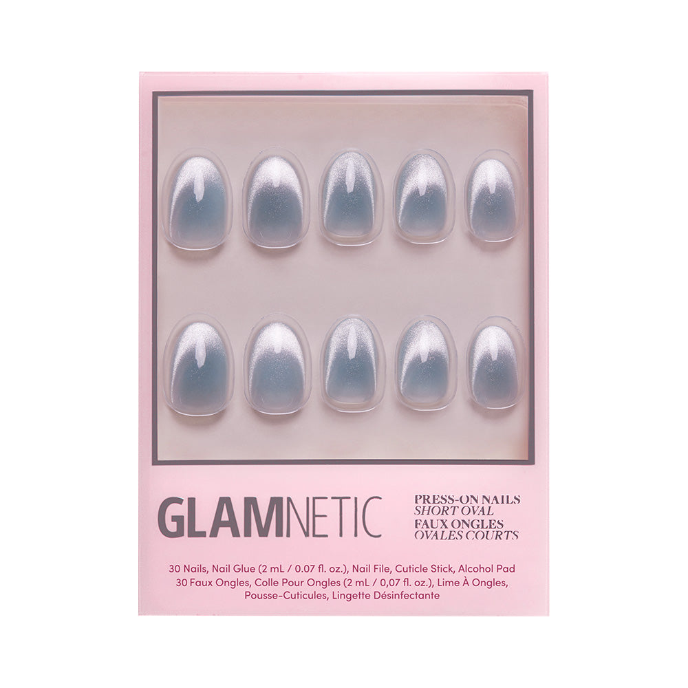 The glamnetic Unicorn Tears Nail Set includes 30 short oval velvet metallic nails in pearlescent white, nail glue, cuticle stick, and alcohol pad. - Product image