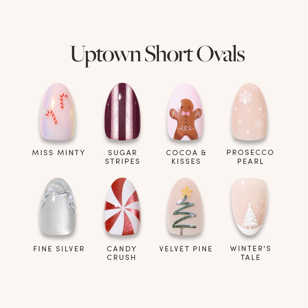 The glamnetic Uptown Short Ovals bundle features eight festive holiday-themed designs, including candy canes, maroon stripes, gingerbread, pearlescent shimmer, silver nails, peppermint swirl, a decorated pine tree, and a snowy winter scene—each short oval press-on nail comes with its own unique name. - Product image