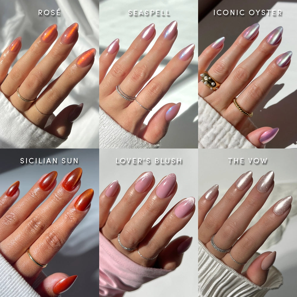 Six hands display manicured nails in various shades and finishes—including orange (rosé), iridescent blue with a velvet effect (seaspell), chrome silver (iconic oyster), deep gold (sicilian sun), soft pink (lover’s blush), and glitter silver (the vow)—all showcasing Velvet Vanity press-on nails from glamnetic, designed in a short almond shape for a flawless, salon-quality manicure. - Product image