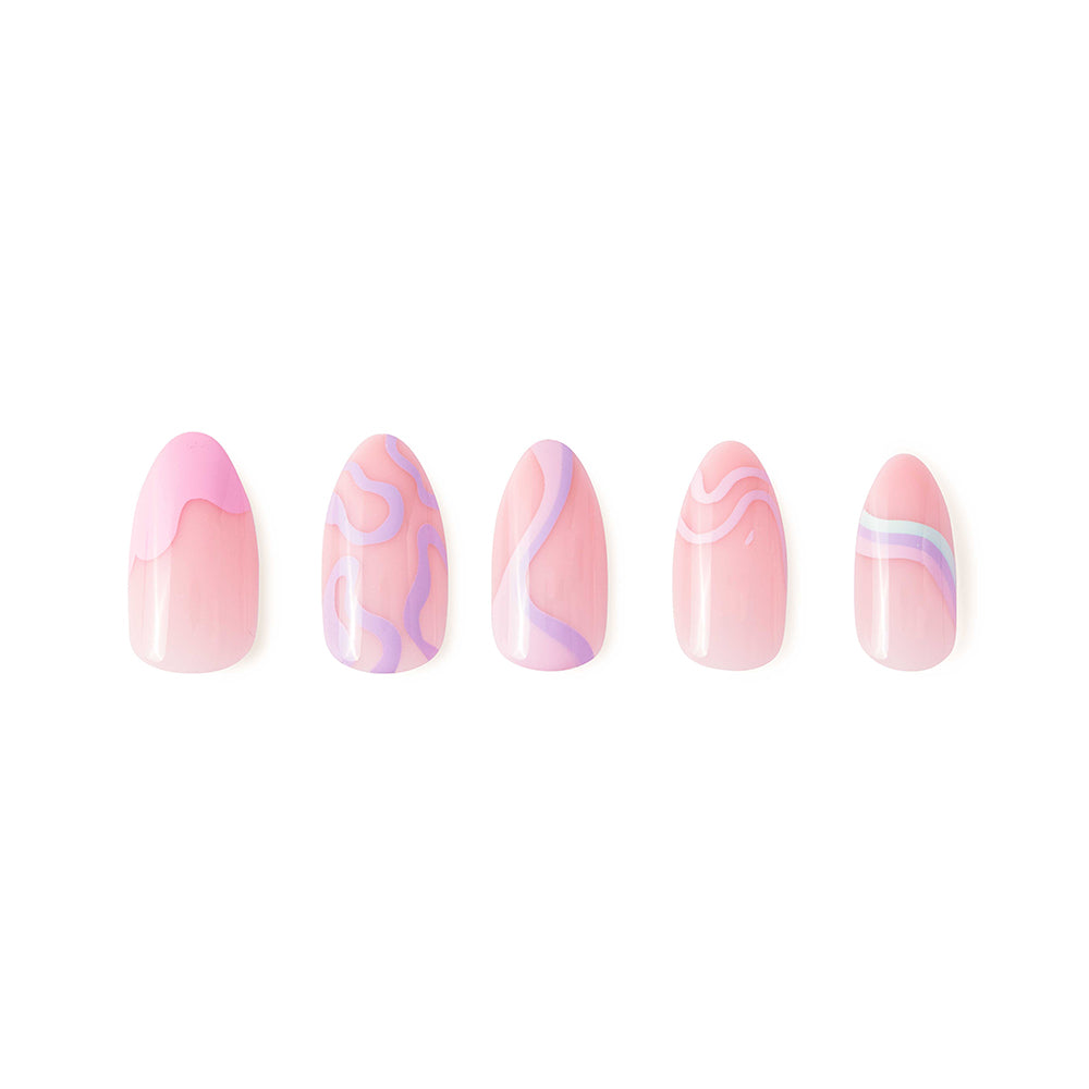 The Wild Card by glamnetic features five almond-shaped artificial nails with a glossy pink base, each showcasing unique artsy designs in pink, purple, and white, displayed in a row on a white background. - Product image
