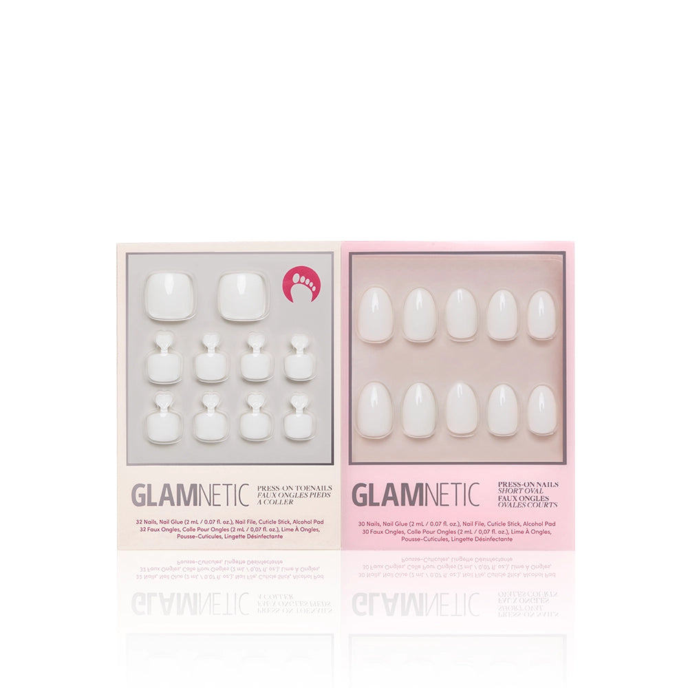 Two boxes of glamnetic White Swan Mani & Pedi: the left contains short square glossy off-white nails, and the right has longer oval styles—both in clear packaging for a perfect mani pedi set. - Product image