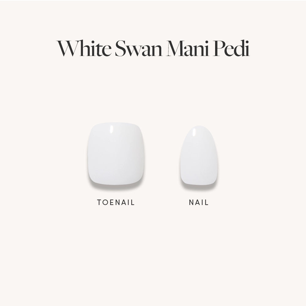 Two artificial press-on nails on a white background: a large square toenail (left) and small oval fingernail (right). Above, text reads "White Swan Mani & Pedi" by glamnetic, featuring elegant off-white nails.