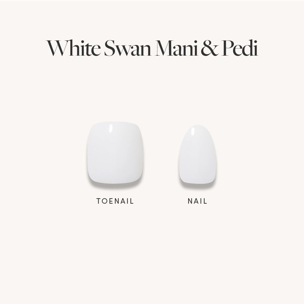 Two artificial press-on nails on a white background: a large square toenail (left) and small oval fingernail (right). Above, text reads "White Swan Mani & Pedi" by glamnetic, featuring elegant off-white nails.