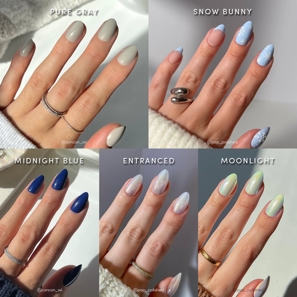 A collage of five manicured hands displays glamnetic’s Winter Toast Bundle: cool matte gray, light blue with snowflakes, glossy dark blue, iridescent pinkish, and pearly green winter nail designs.