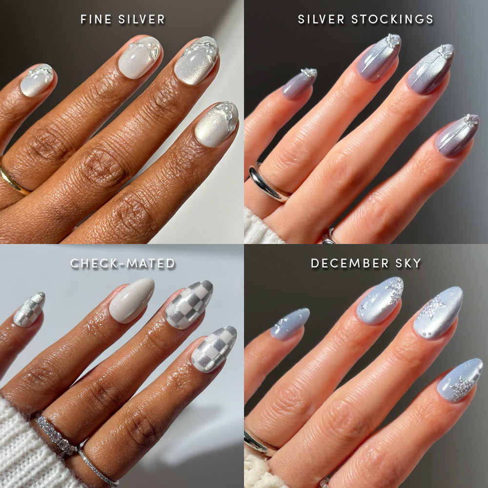 Four hands display glamnetic’s Winter Village nail bundle of striking salon-quality manicures: pearly silver, gray ombre tips, white-gray checkerboard, and blue with glitter. Each look is labeled: Fine Silver, Silver Stockings, Check-Mated, December Sky—perfect press-on nails for a stunning seasonal statement. - Product image