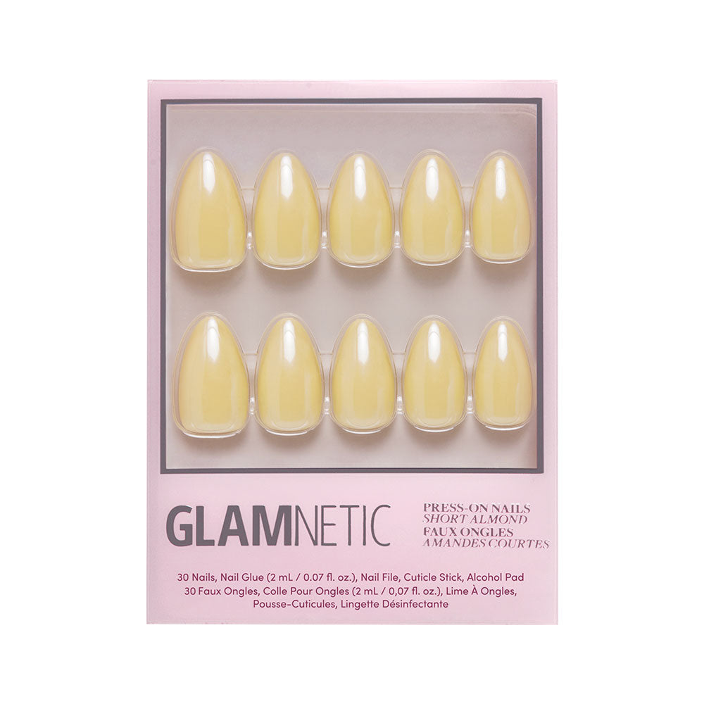 A box of glamnetic Yellow Pop press-on nails in a short almond shape with a pastel yellow color, featuring 10 displayed nails and product info on the packaging. - Product image