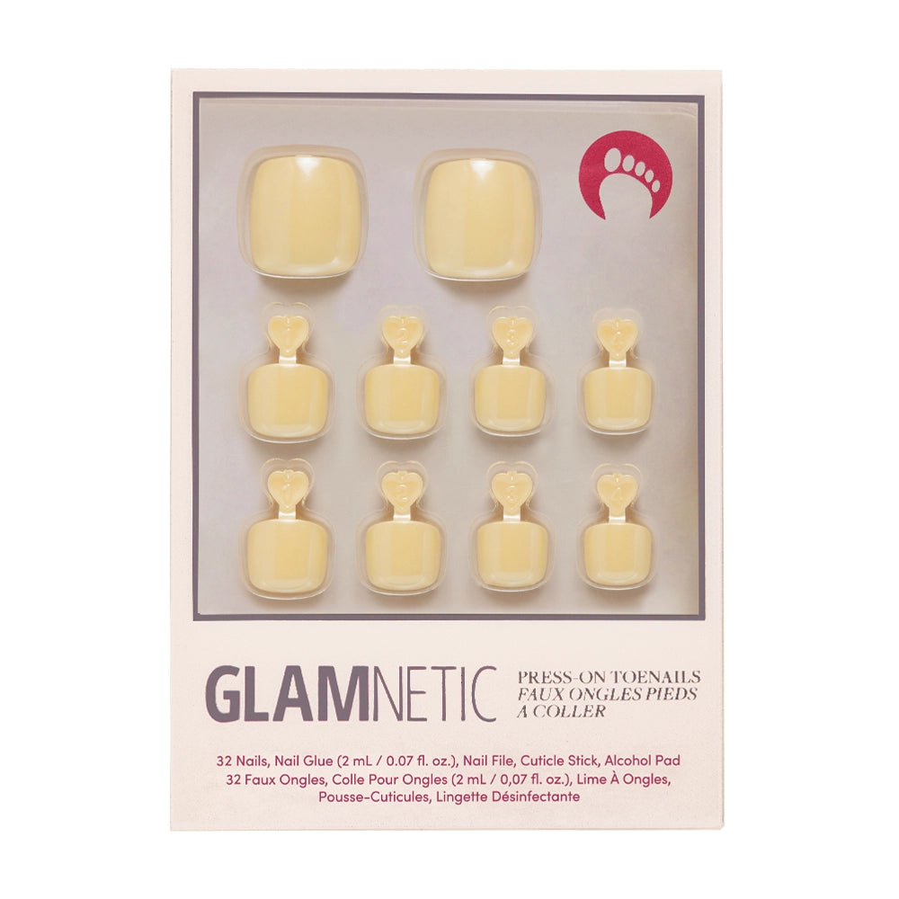 A box of Glamnetic press-on toenails in a creamy pastel yellow color. - Product image