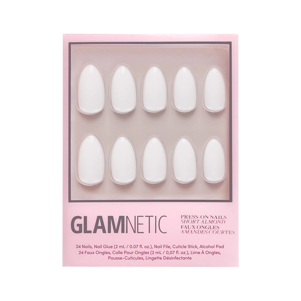 A box of glamnetic Angel vegan press-on nails in a short almond shape. The pink box displays ten white artificial nails through a clear window, with product details printed below. - Product image