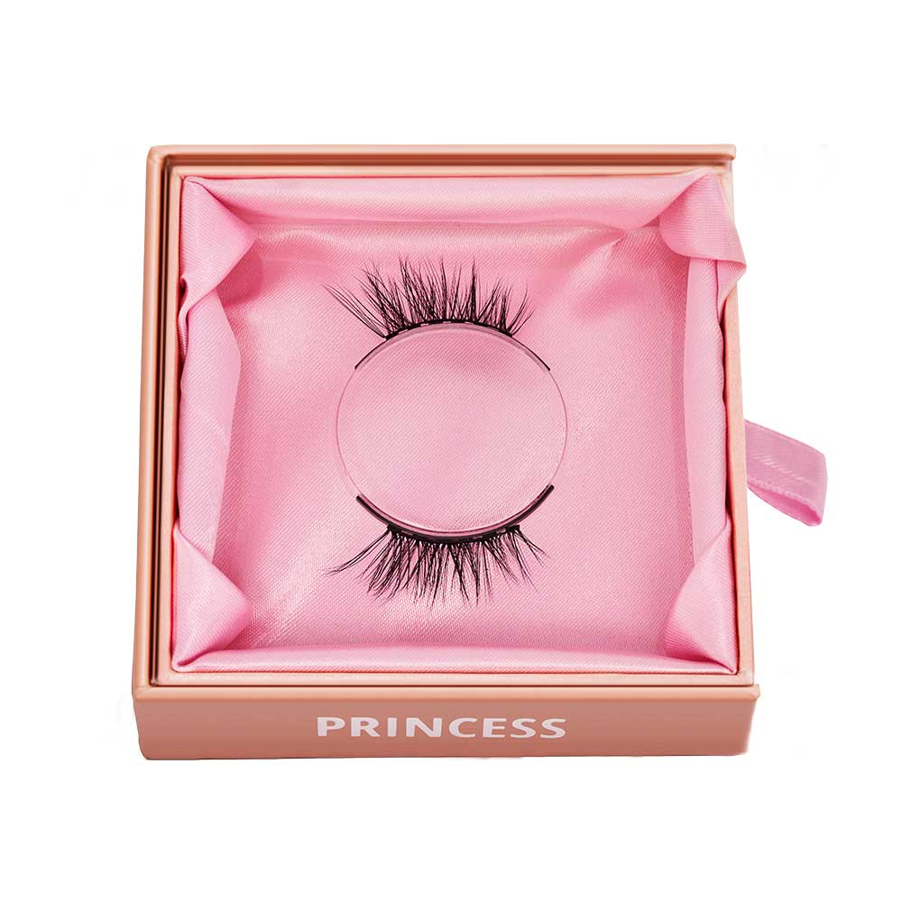 A pair of reusable cat-eye false eyelashes from glamnetic, named Princess, displayed in a pink satin-lined box with PRINCESS on the front. - Product image