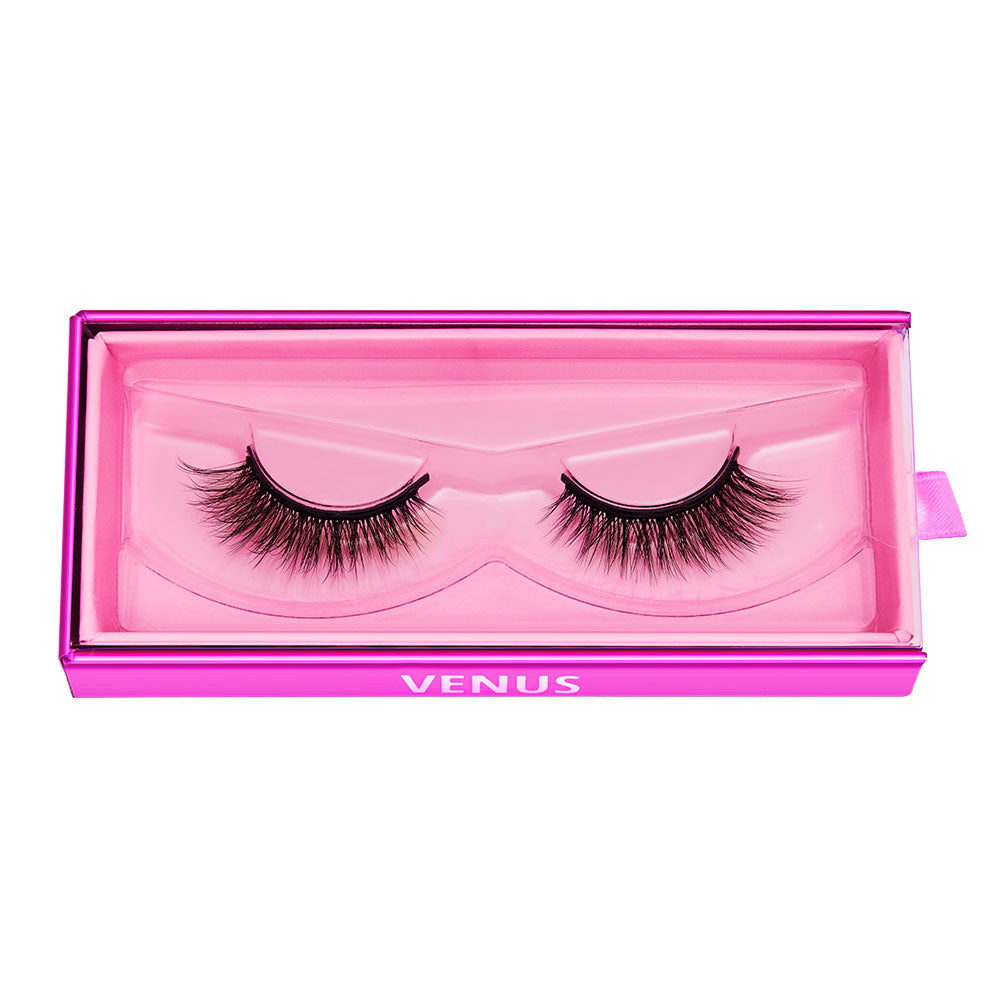 A pair of vegan-friendly glamnetic Venus lashes in a pink rectangular case labeled Venus, with the lashes showcased on a clear plastic tray inside. - Product image