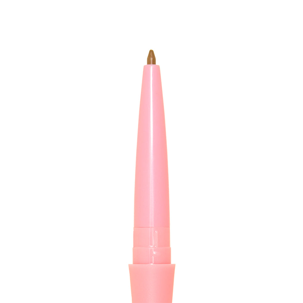 A close-up of the glamnetic 3-in-1 Brow It All mechanical brow pencil in pink, with its brown tip extended, set against a white background. - Product image