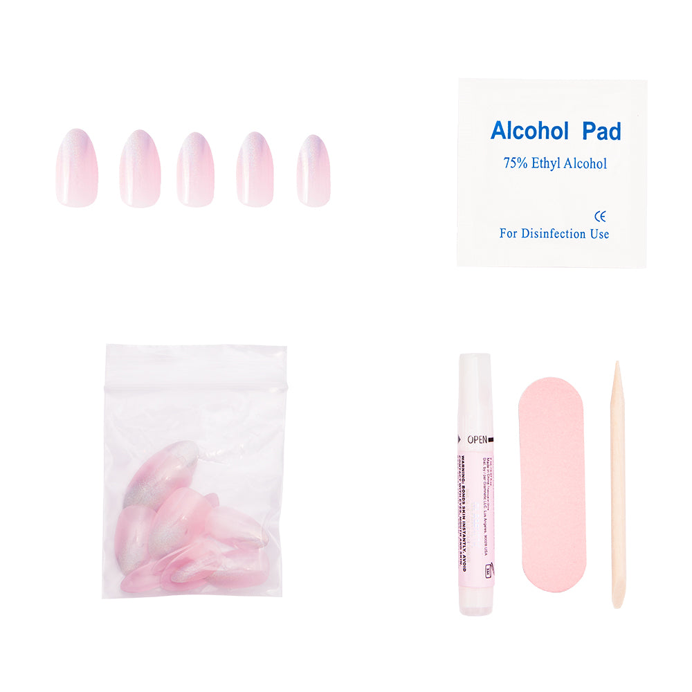 The glamnetic Winter Storm press-on nail kit features five almond-shaped, ombre pink nails with a semi-transparent finish, plus extra nails, an alcohol pad, nail file, cuticle stick, and glue—all on a white background. - Product image